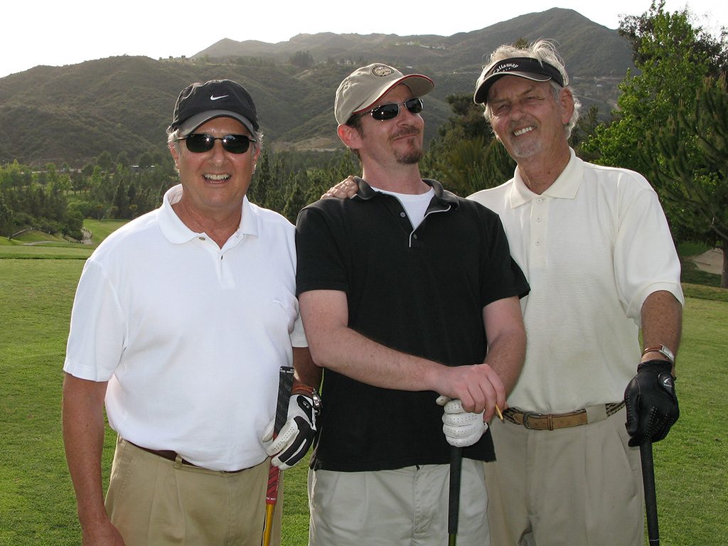 My dad (right) with me and our family friend Bruce Carlin on a golf day at Malibu in 2007.